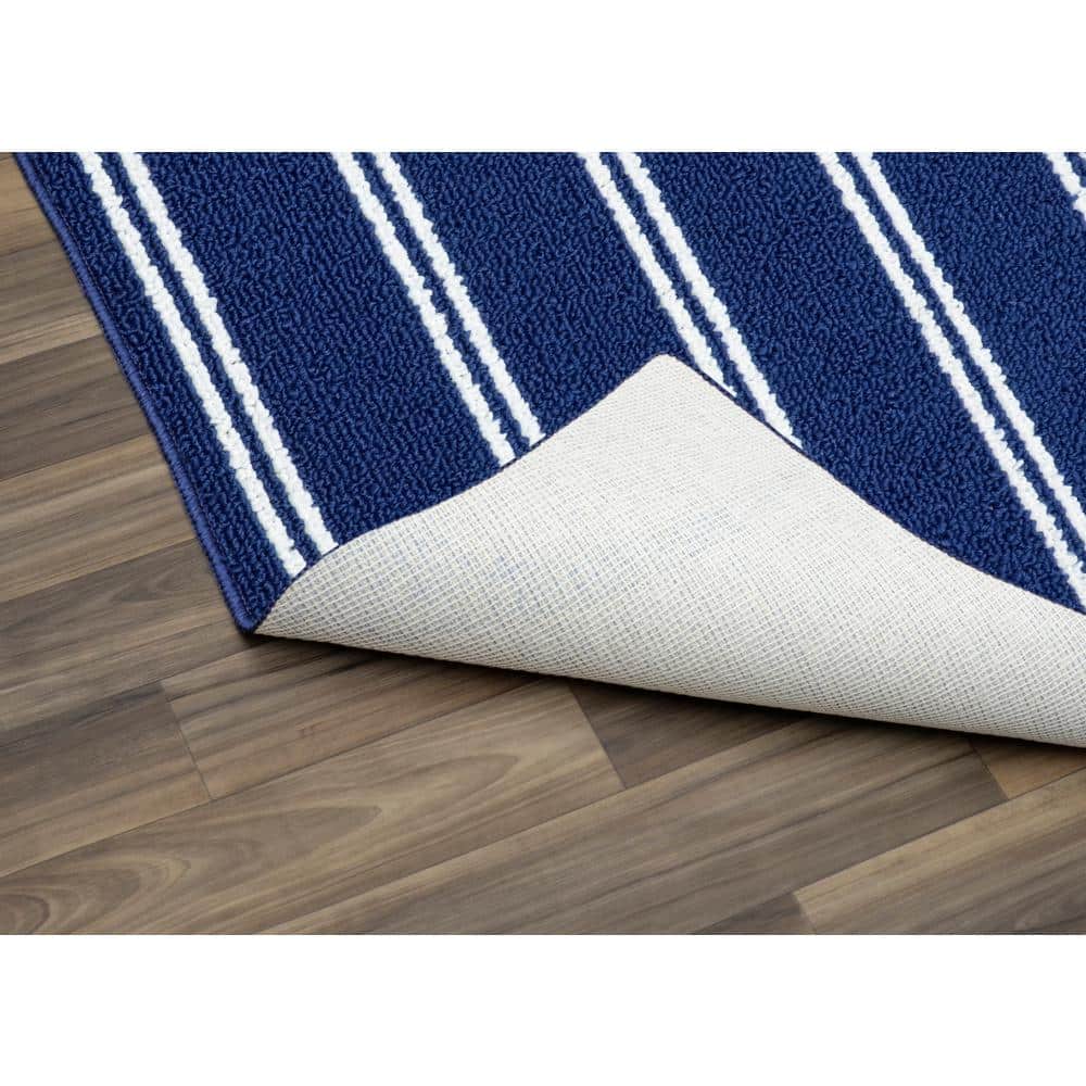Avery 5' x 7' Blue Tufted Synthetic Stripe Area Rug