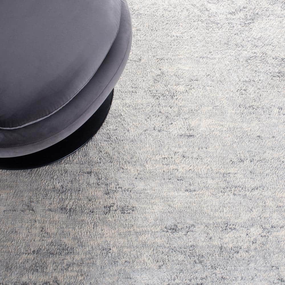 Brentwood Ivory and Gray 8' x 10' Synthetic Rectangular Area Rug
