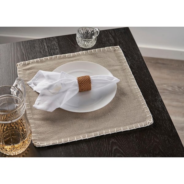 https://images.thdstatic.com/productImages/22fd575f-30d2-43fe-93a5-0ea151524fe3/svn/beige-cream-lr-home-placemats-5516a5084d9348-31_600.jpg