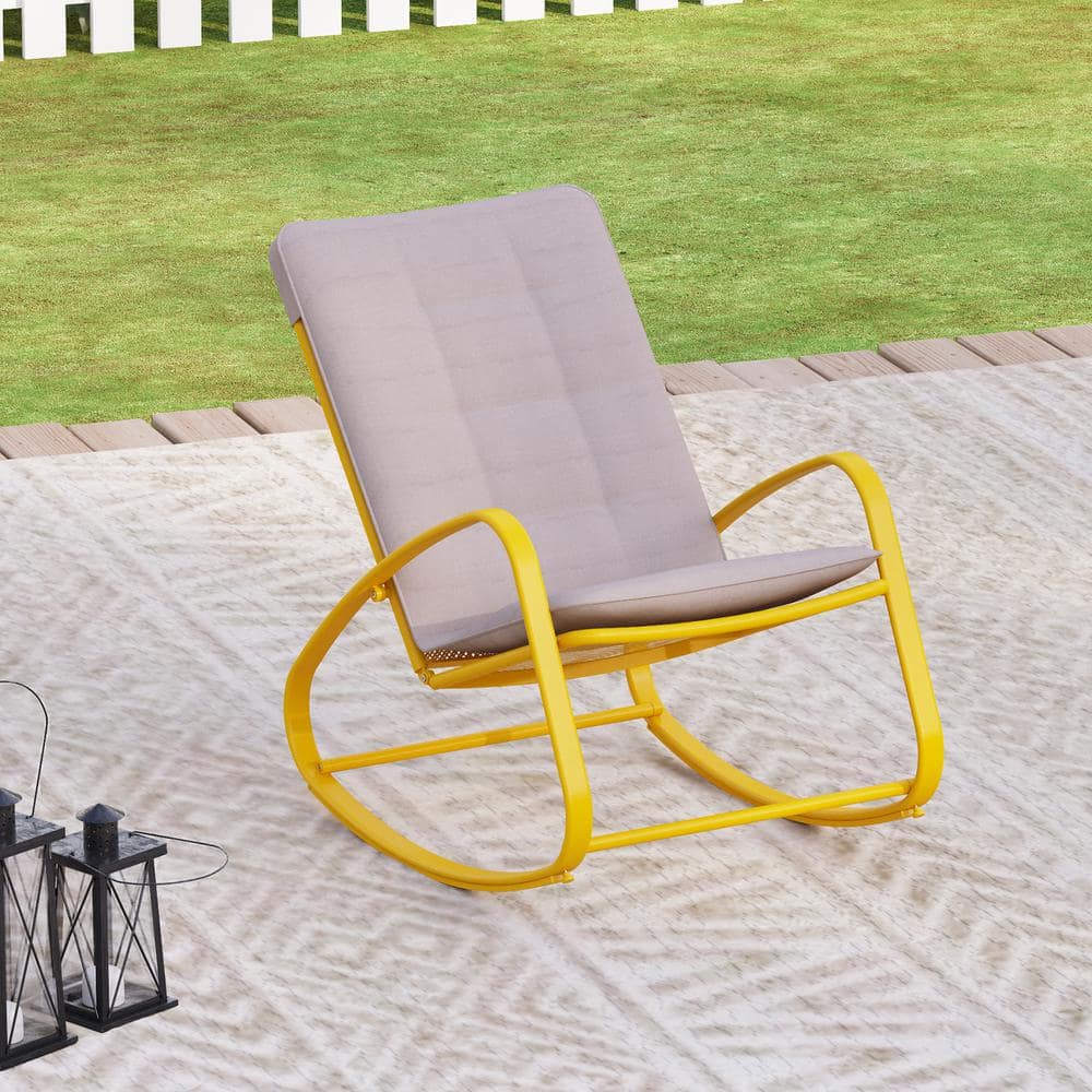 yellow metal rocking chair