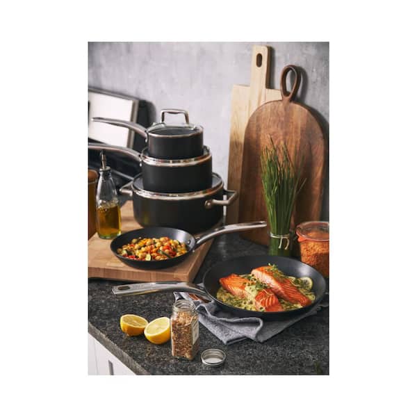 https://images.thdstatic.com/productImages/231314b5-22ef-407e-bc57-7656e4aac394/svn/black-t-fal-pot-pan-sets-c517sa75-77_600.jpg