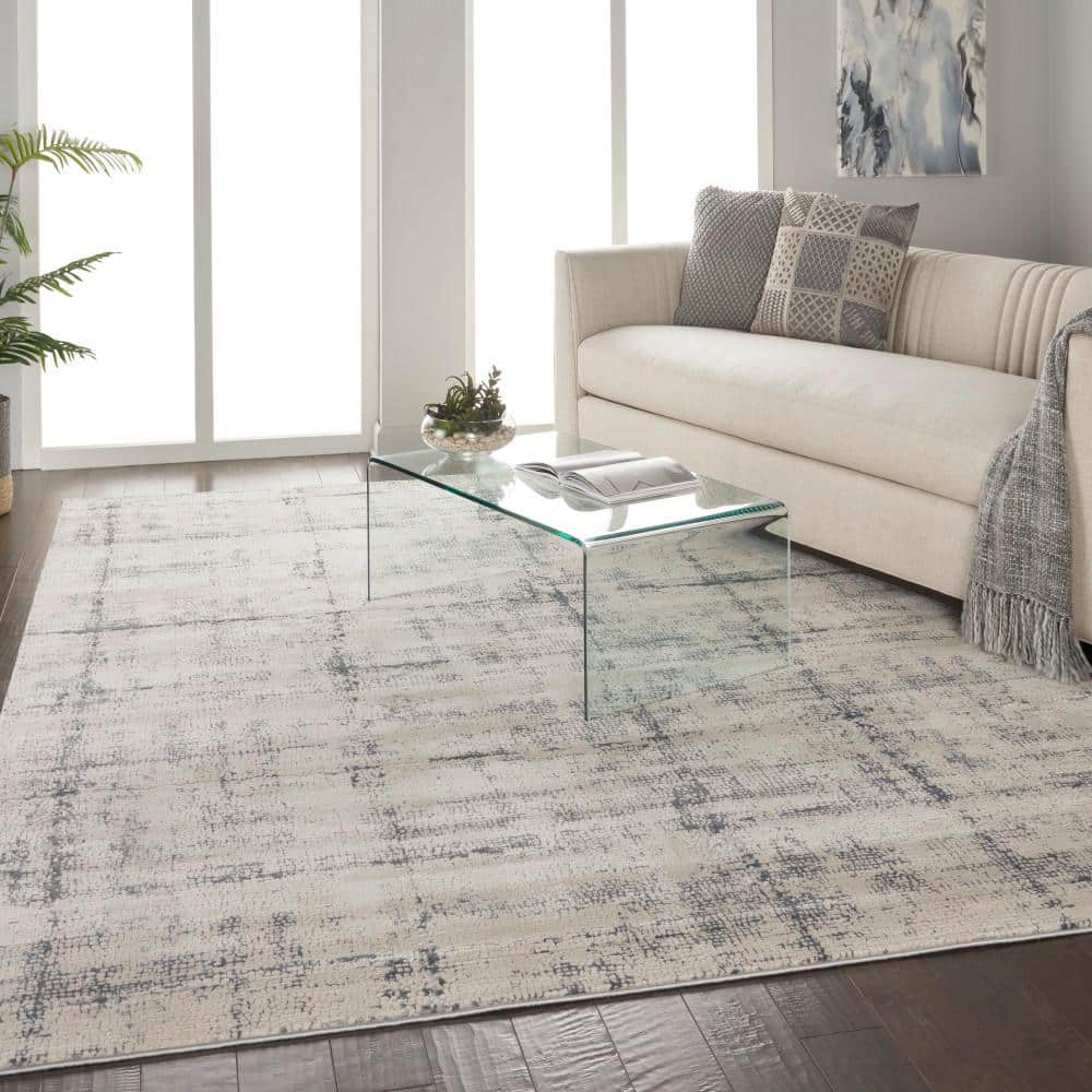 Modern Abstract Ivory & Blue Synthetic Area Rug 7'10" x 10'6"