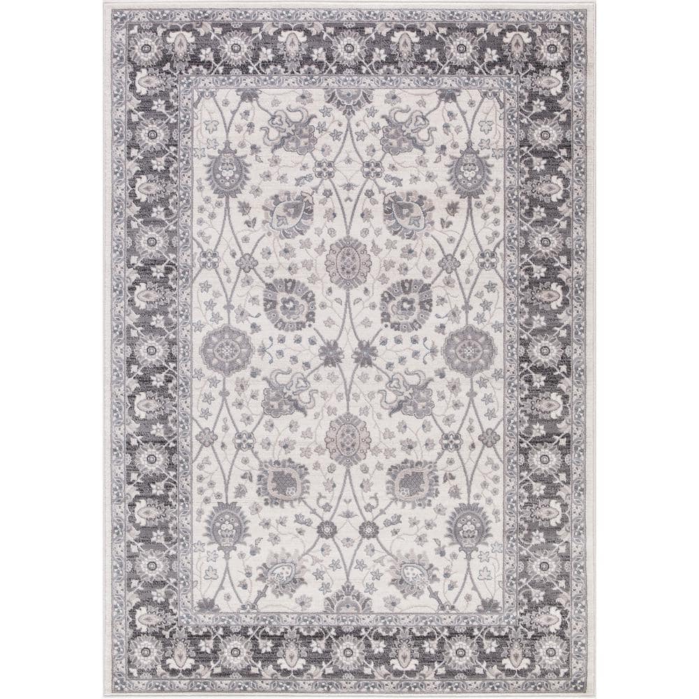 Ivory and Grey Tufted Synthetic 6'7" x 9'3" Stain-Resistant Area Rug