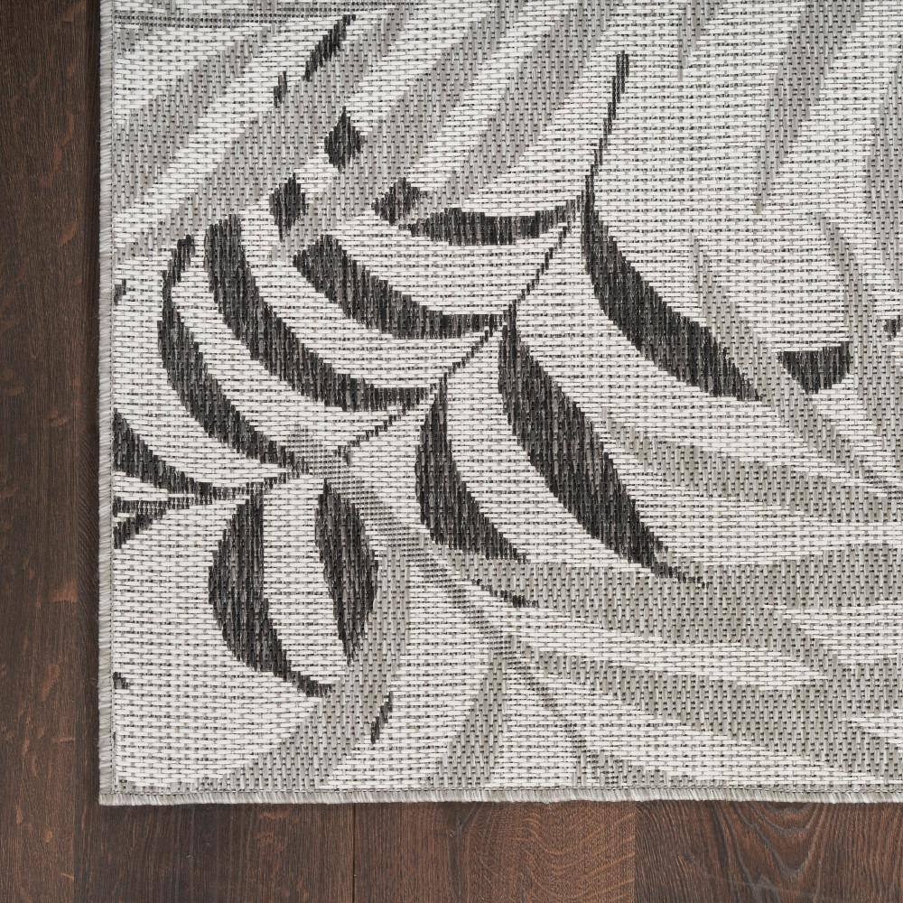 Gray Tropical Leaf Pattern 5' x 7' Synthetic Outdoor Rug