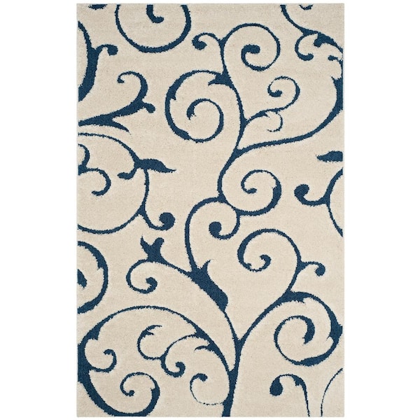 SAFAVIEH Florida Shag Cream/Blue 6 ft. x 9 ft. High-Low Floral Area Rug