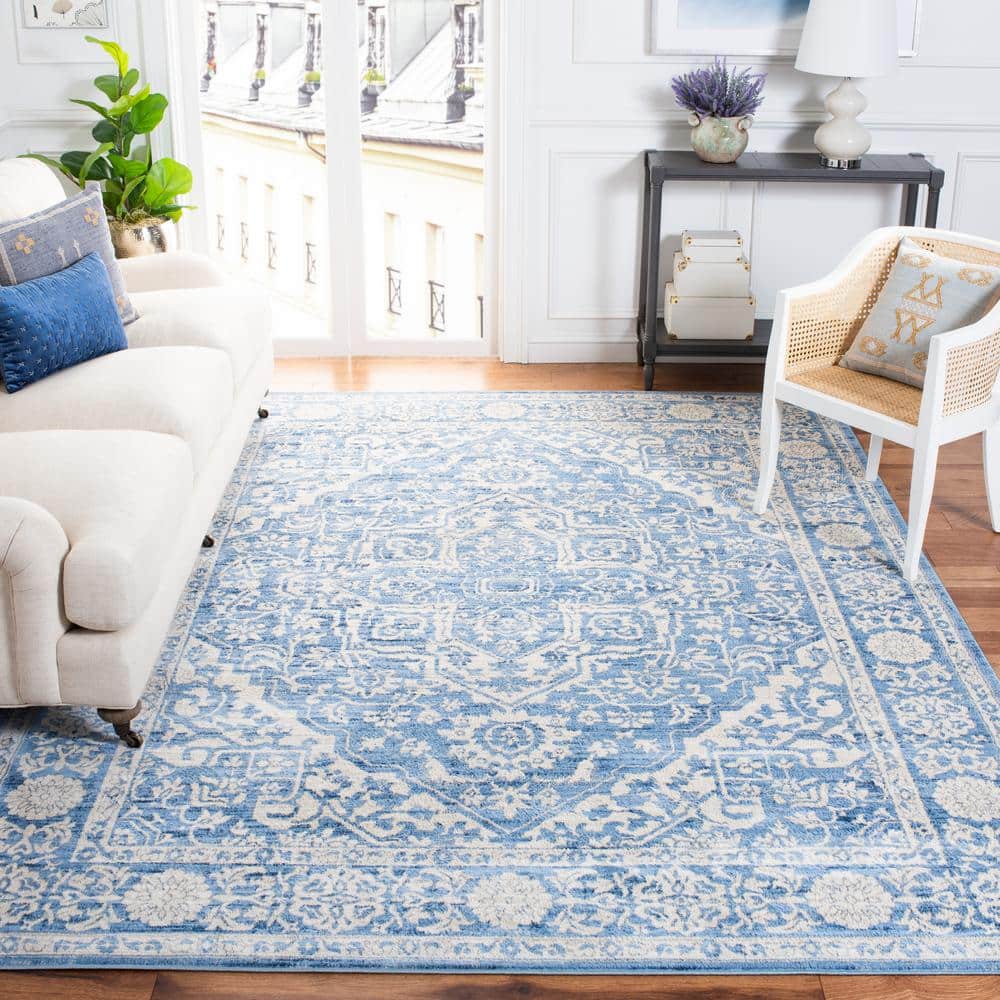 Ivory and Navy 8' x 10' Synthetic Washable Reversible Area Rug