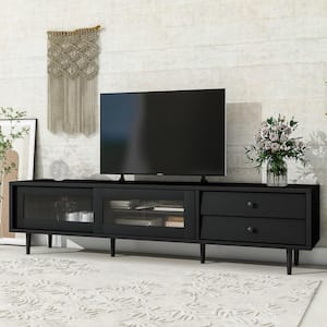 Black Elegant TV Stand, Media Console Fits TV's up to 75 in. with Sliding Fluted Glass Doors, Slanted Drawers Cabinet