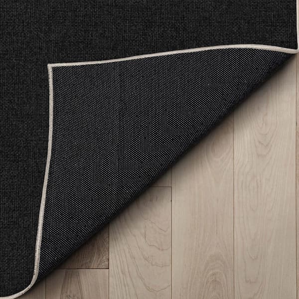 https://images.thdstatic.com/productImages/235e6cde-cbfd-4a7d-95a8-856ceff93021/svn/black-well-woven-area-rugs-w-pl-02b-2s-4f_600.jpg