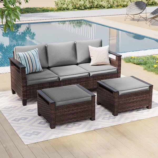 Sonkuki 3-Piece Brown Wicker Gray Cushions Patio Conversation Set Comprising a 3-Seater Sofa and 2-Ottomans