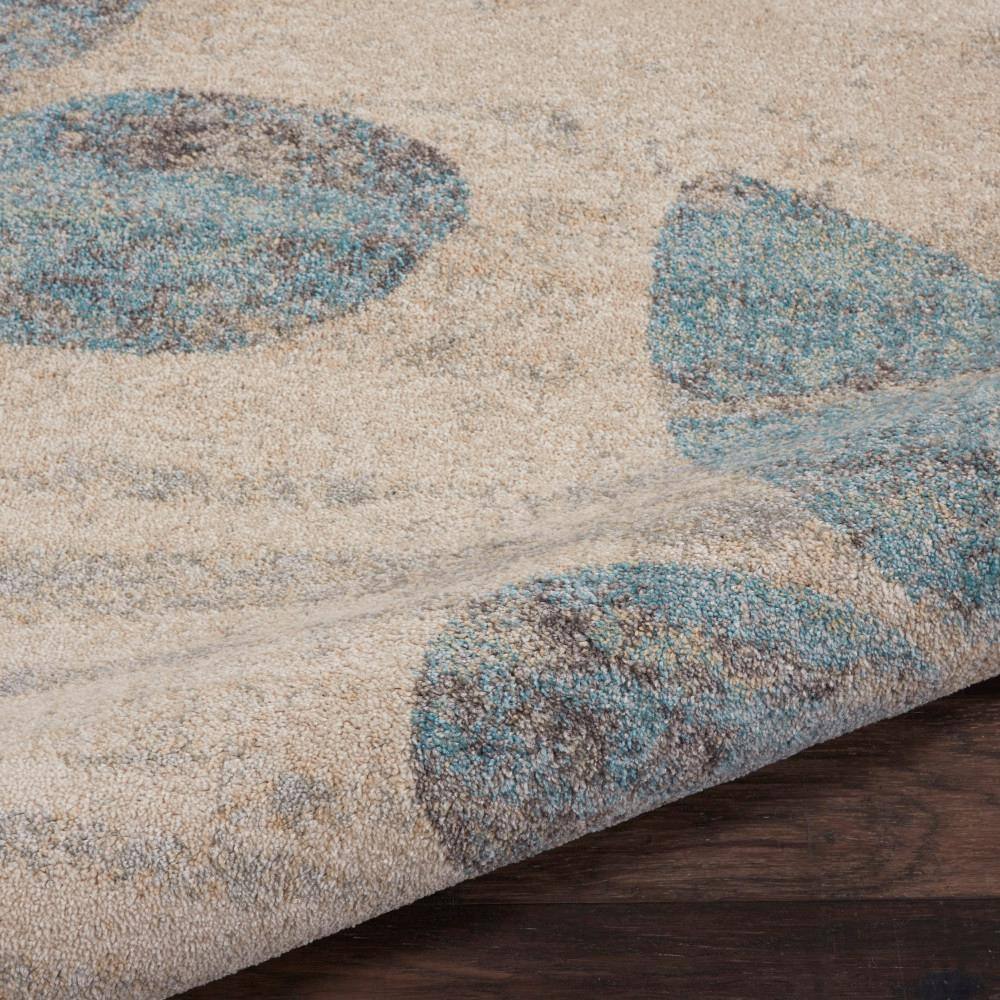 Ivory and Light Blue Floral Synthetic 8' x 10' Area Rug