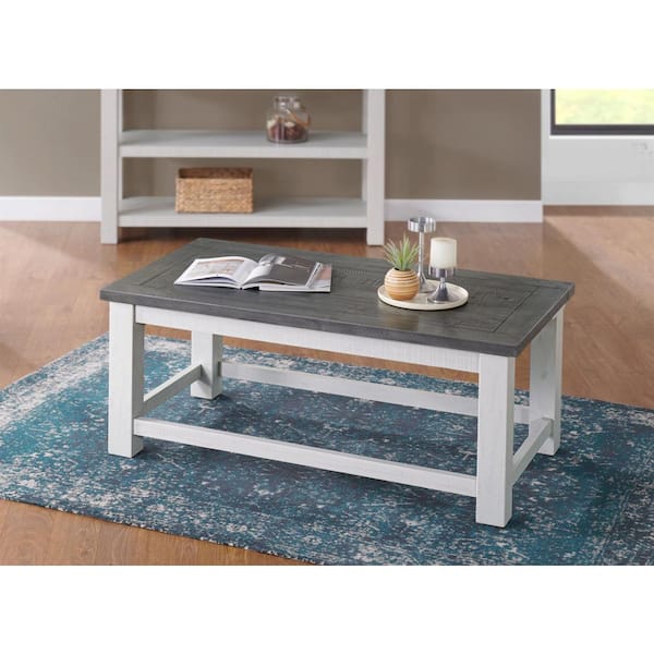 white coffee table with stained top