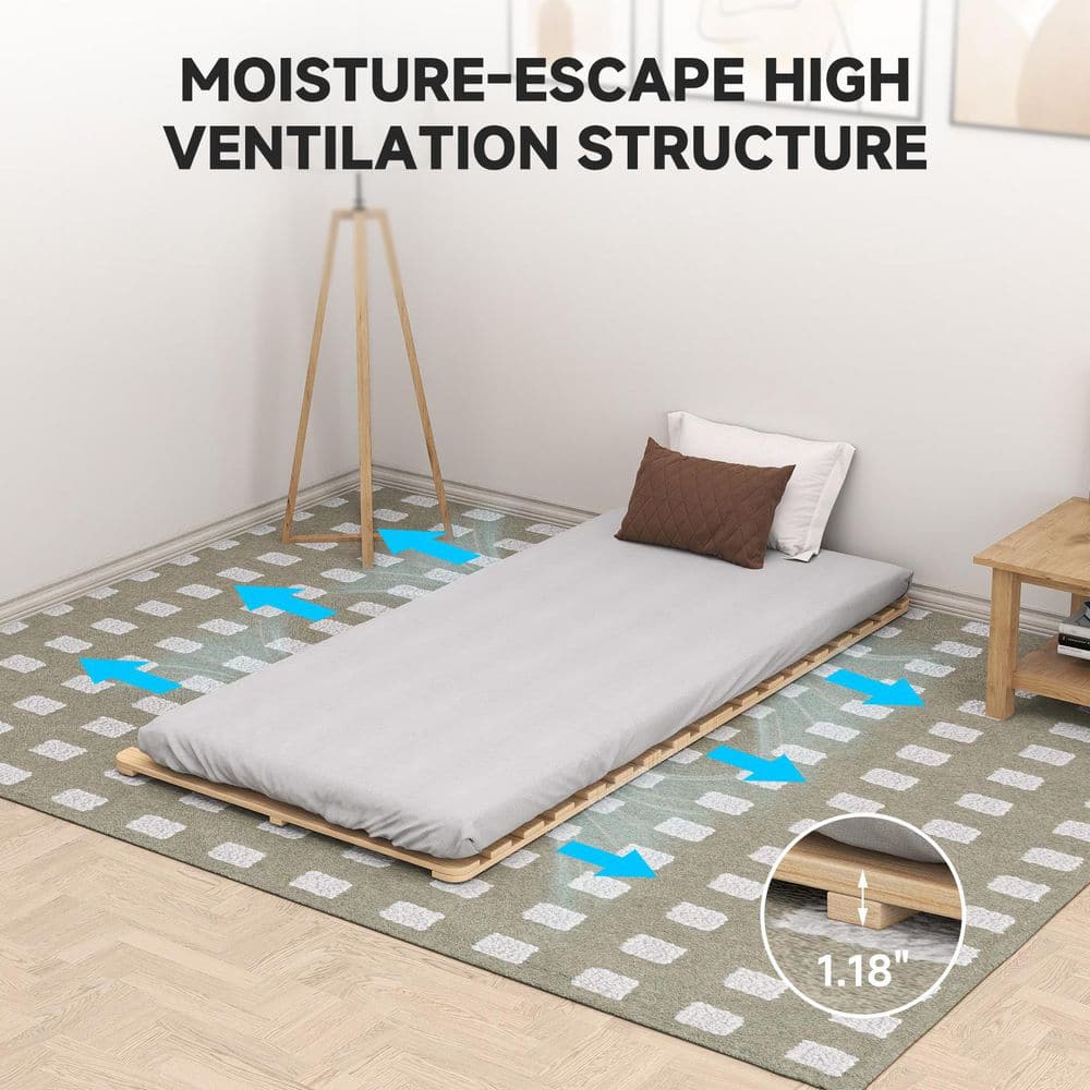 A mattress on the slatted bed frame illustrating moisture-escape ventilation.