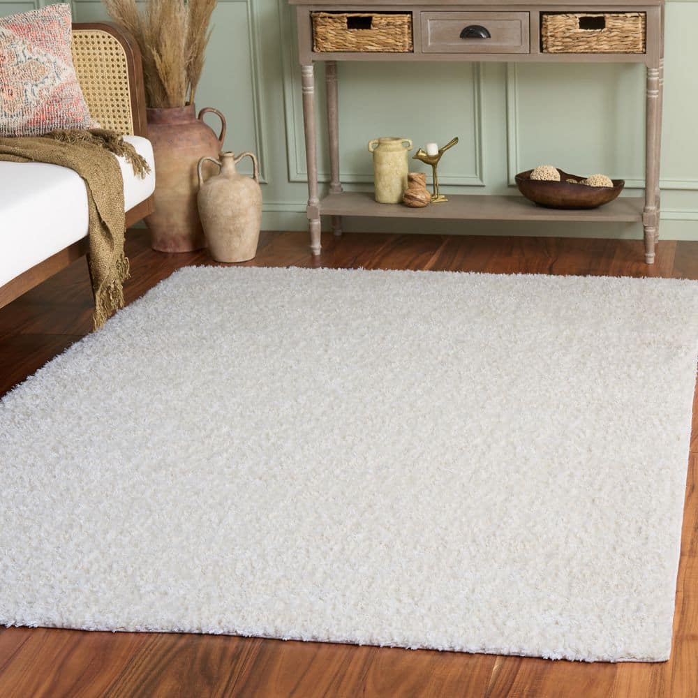 Everett Shag 8 ft. x 10 ft. Ivory Solid Color Area Rug price history on PriceWatchPro