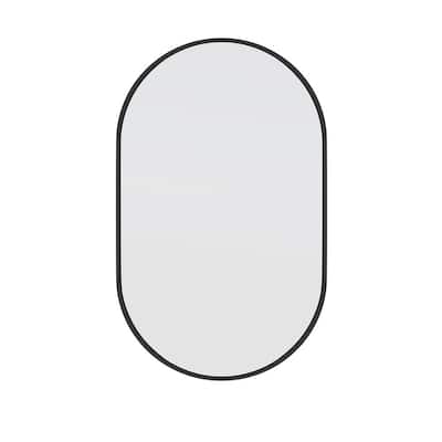 22 in. W x 36 in. H Stainless Steel Framed Pill Shape Bathroom Vanity Mirror in Black