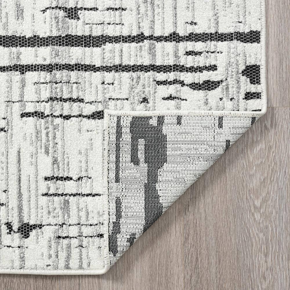 Contemporary Black Stripe Polypropylene 5'3" x 7'3" Outdoor Rug