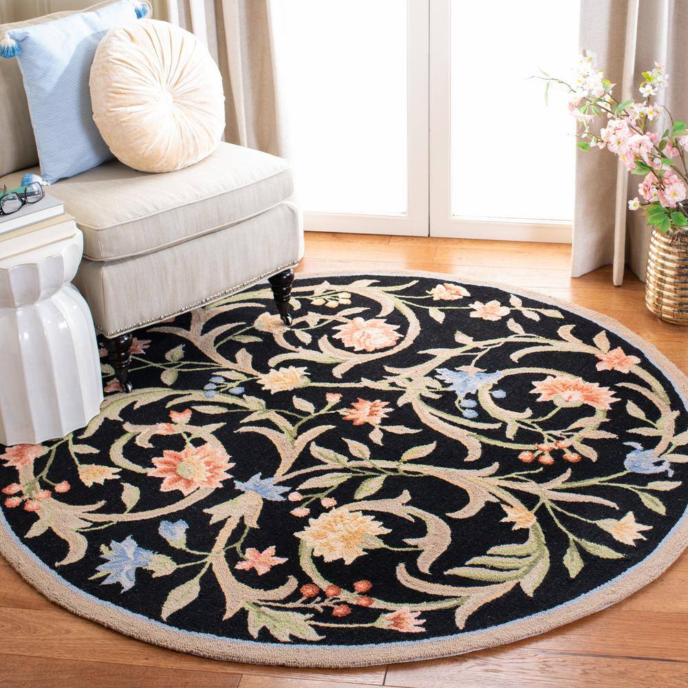 Handcrafted Black Floral Wool 8' Round Area Rug