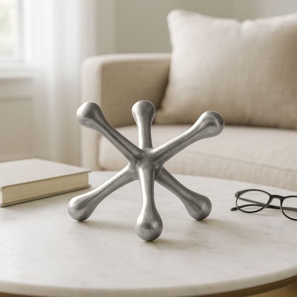 Liv & Skye Silver 8 in. x 5 in. Metal Jacks Abstract Sculpture