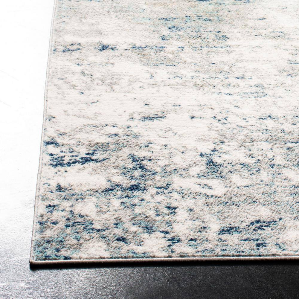 Grey and Blue Abstract 8' x 10' Synthetic Area Rug