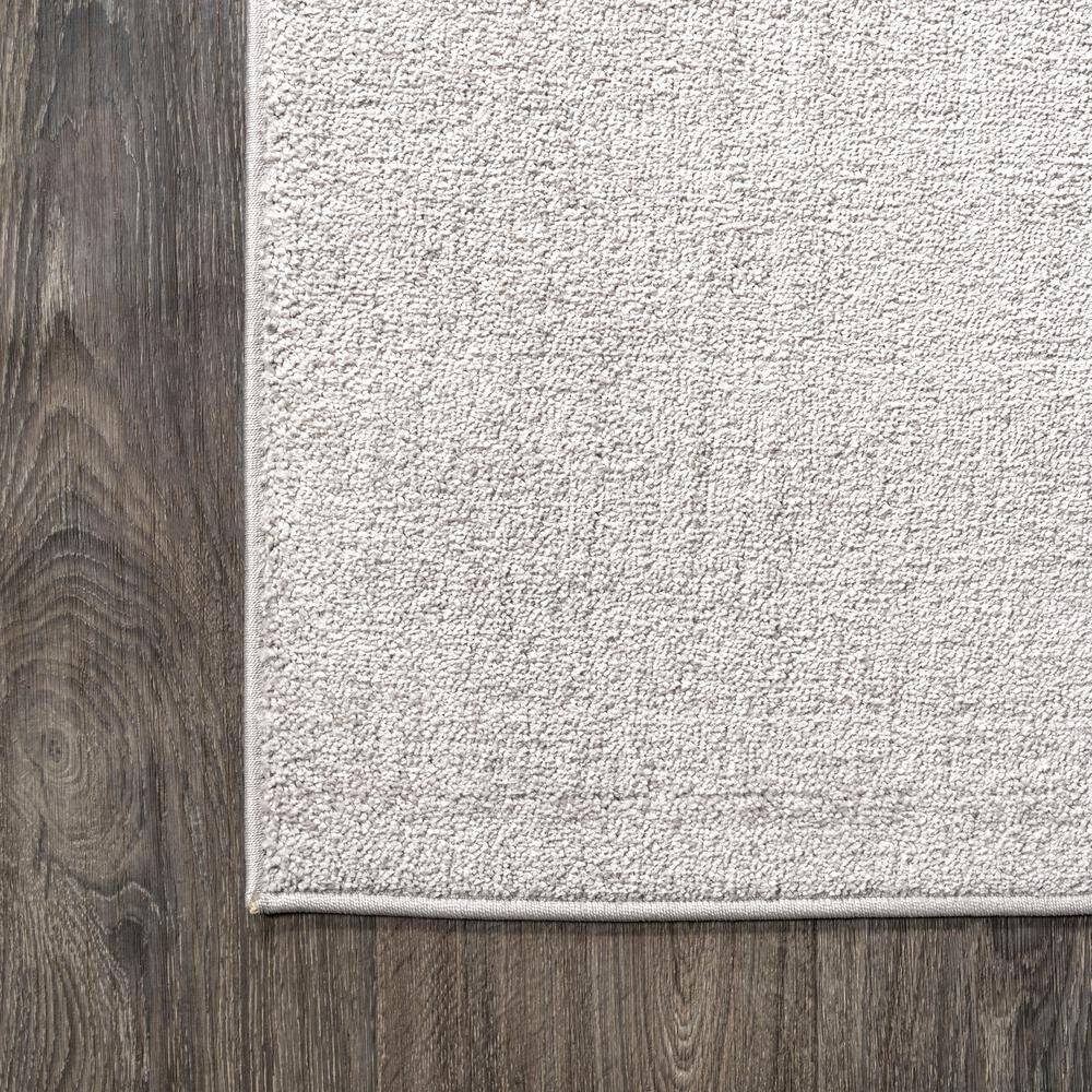 Ivory Soft Synthetic 5' Square Easy-Care Area Rug