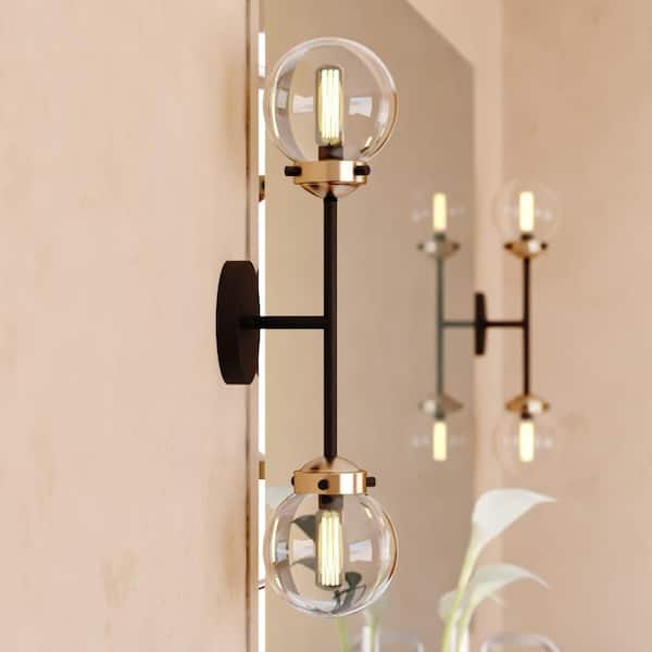 VAXCEL Orbit 2-Light Brass and Oil Rubbed Bronze Wall Sconce Industrial MCM Clear Glass Globe