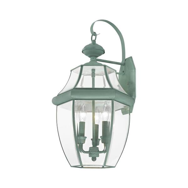 https://images.thdstatic.com/productImages/23ed3f31-42ee-449a-90d6-21eb17e6475c/svn/verdigris-livex-lighting-outdoor-sconces-2351-06-4f_600.jpg