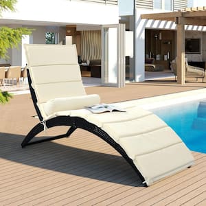 Black PE Wicker Outdoor Sun Lounger, Foldable Chaise Lounger with Beige Removable Cushion and Bolster Pillow