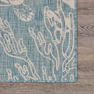 Naira Tropical Aqua Blue/White 5 ft. 3 in. x 7 ft. Turtle Reef Polypropylene Indoor/Outdoor Area Rug