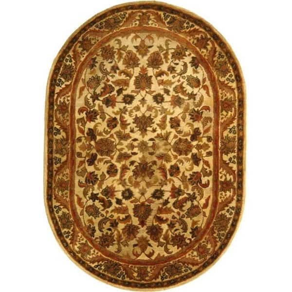SAFAVIEH Antiquity Gold 5 ft. x 7 ft. Oval Floral Solid Border Area Rug