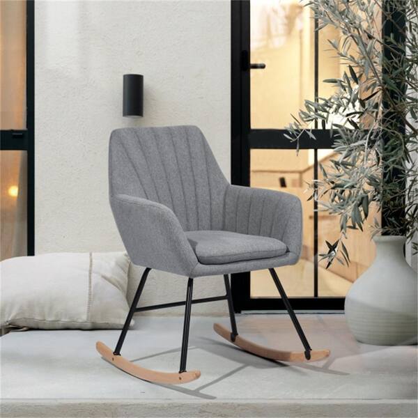 gray upholstered rocking chair