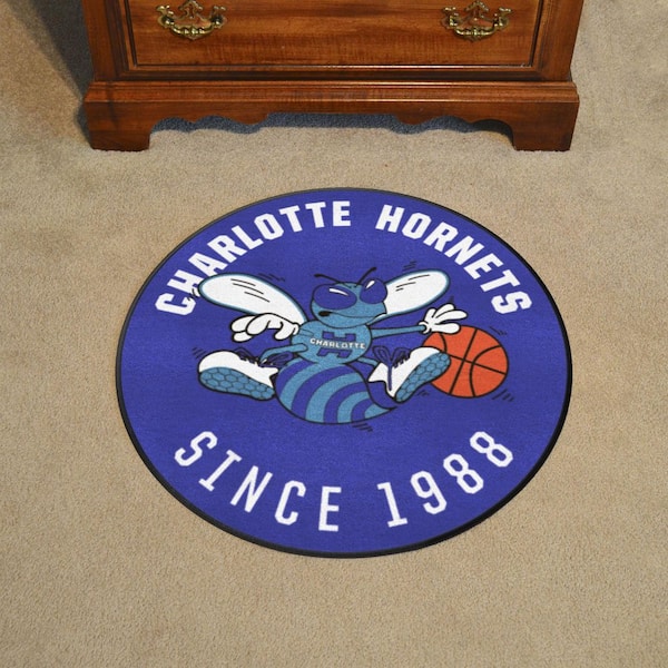 FANMATS NBA Retro Charlotte Hornets Blue 5 ft. x 8 ft. Plush Area Rug 35247  - The Home Depot
