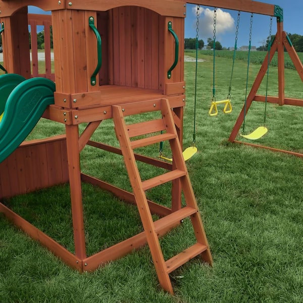 Backyard Discovery Atlantis All Cedar Wood Children s Swing Set Playset with Elevated Clubhouse Rockwall Swings Trapeze and Wave Slide 1608016BCOM