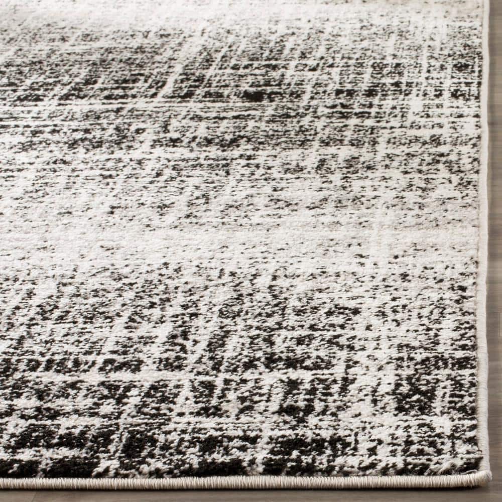 Chic Silver and Black Synthetic 30" Easy-Care Runner Rug