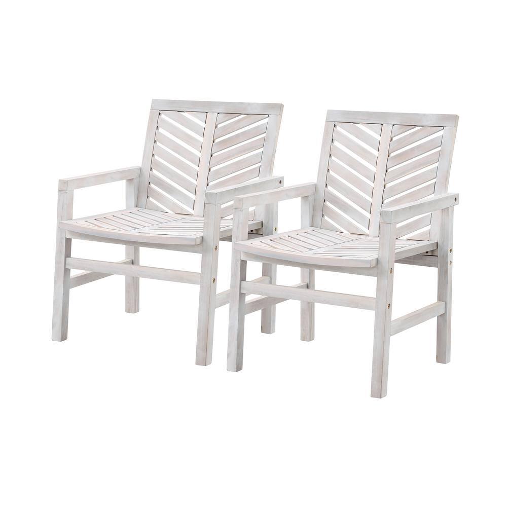 Two white wash acacia wood lounge chairs with chevron backs against a white background.