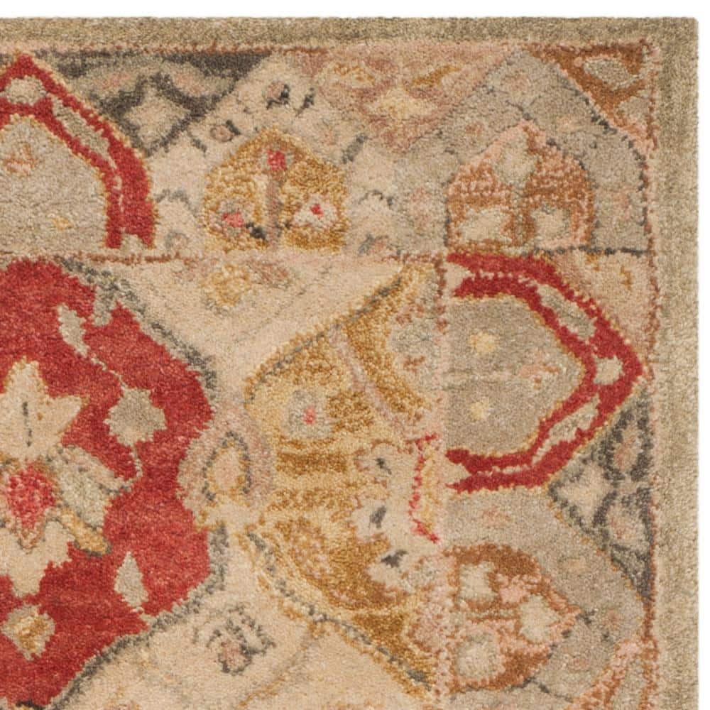 Handmade Tufted Round Red Wool Area Rug