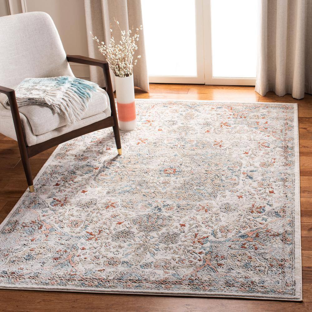 Ivory and Grey Medallion Synthetic 4' x 6' Area Rug