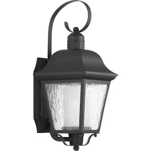 Andover Collection 1-Light Textured Black Clear Water Seeded Glass Modern Farmhouse Outdoor Medium Wall Lantern Light
