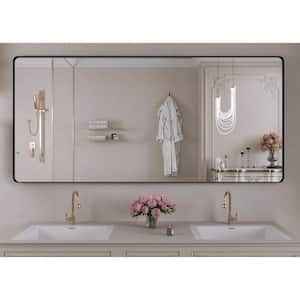 60 in. W x 28 in. H Large Rectangular Angle rounded Framed Wall Mounted Bathroom Vanity Mirror in Black
