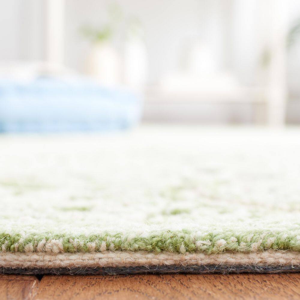 Ivory and Green 9' x 12' Handmade Tufted Wool Area Rug