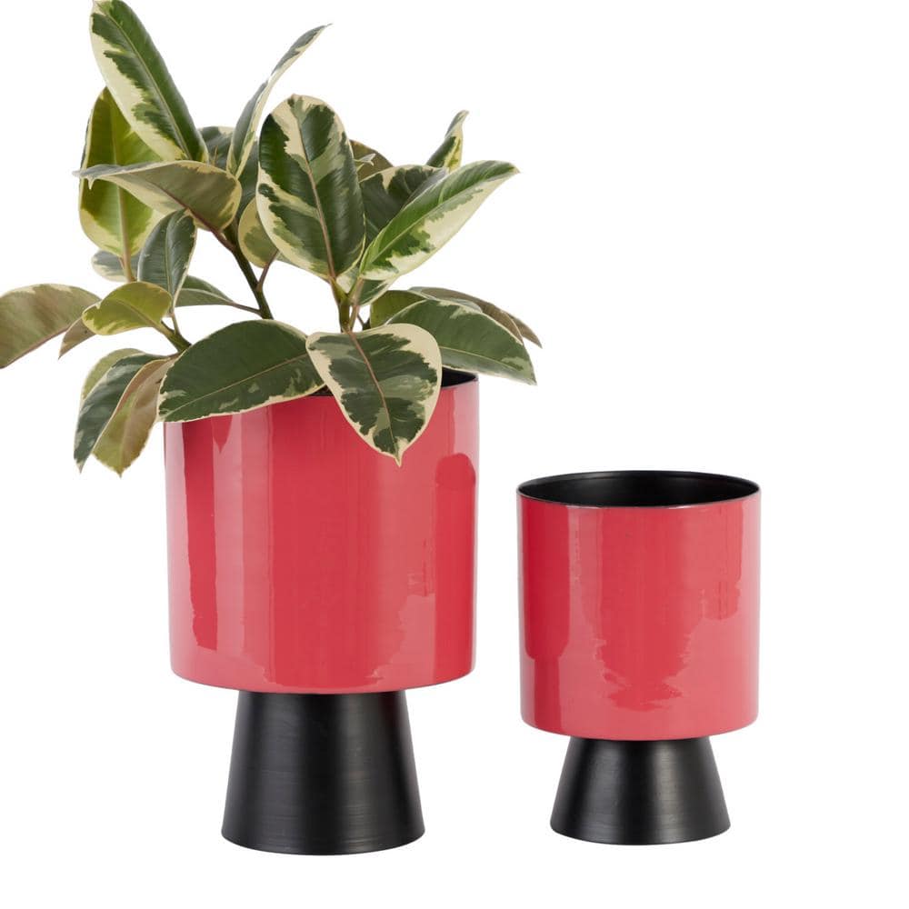 https://images.thdstatic.com/productImages/24796b35-b47c-45e5-905e-cb48fe185c10/svn/red-plant-pots-51988-64_1000.jpg