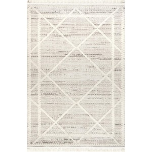 Dazi Beige 5 ft. x 8 ft. Moroccan Tasseled Area Rug