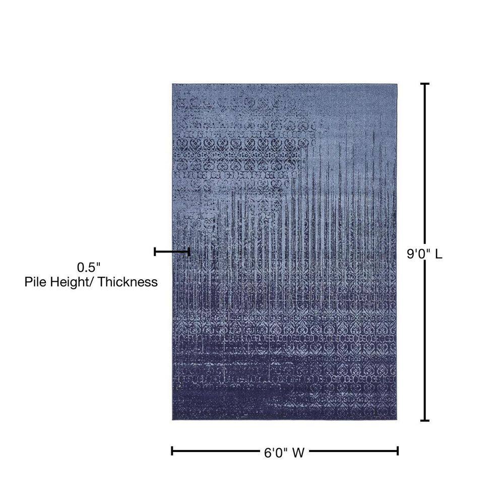 Blue Tufted Washable Reversible 6' x 9' Synthetic Rug