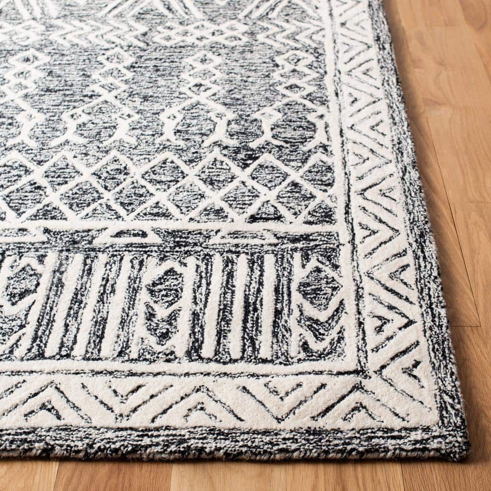 Handmade Black and Ivory Wool Abstract 9' x 12' Area Rug