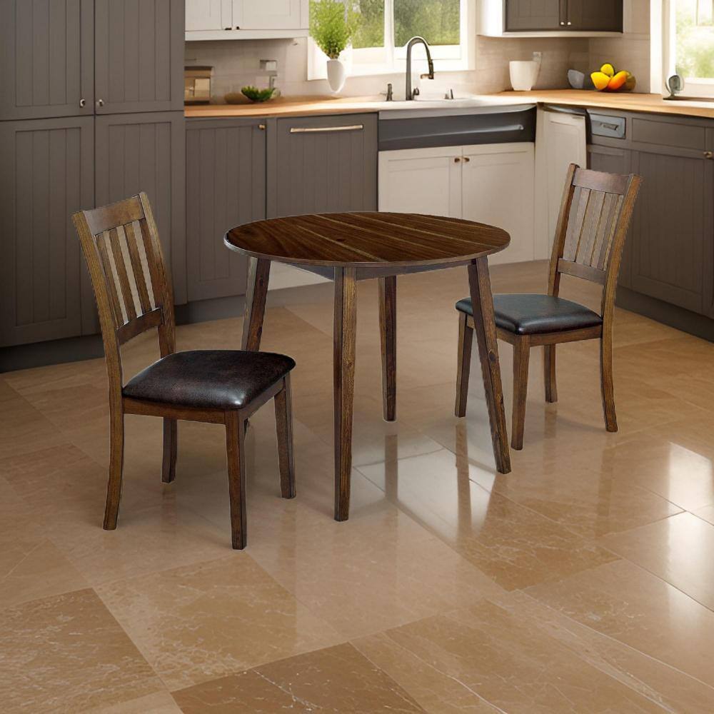 Brown Round Dining Table with Faux Leather Chairs