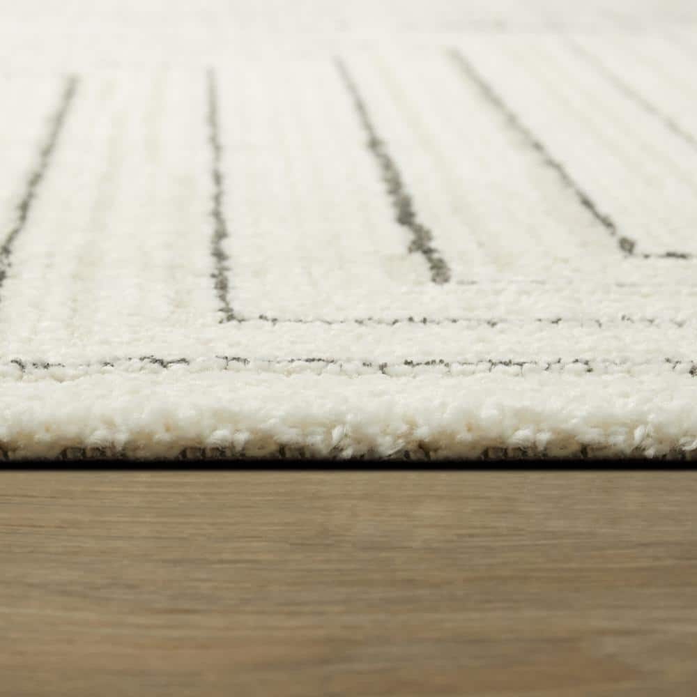 Carmody Cream and Black Geometric Synthetic Runner Rug