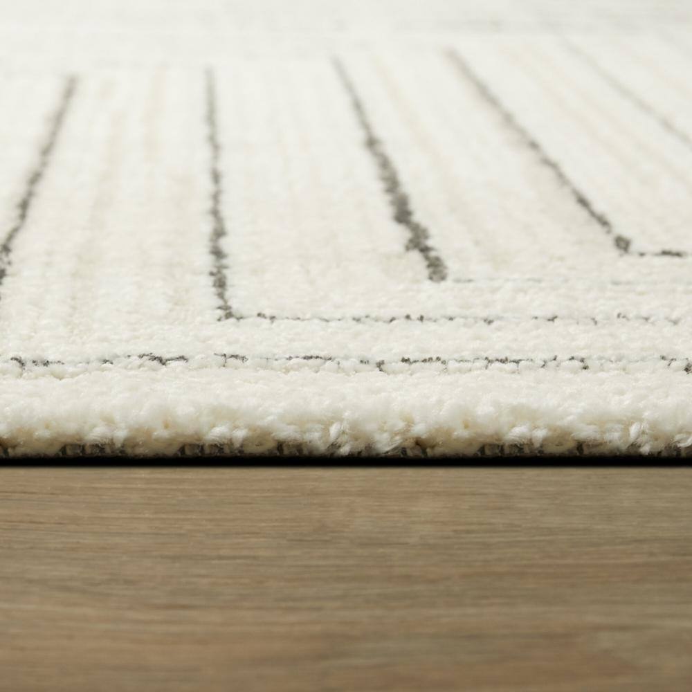 Cream Geometric Synthetic Rectangular Area Rug 6 x 9 ft