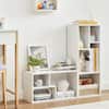 Two white 4-tier adjustable shelf bookcases arranged in a room.