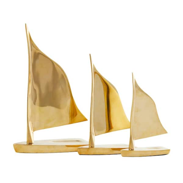 Litton Lane Gold Metal Sail Boat Sculpture (Set of 3)