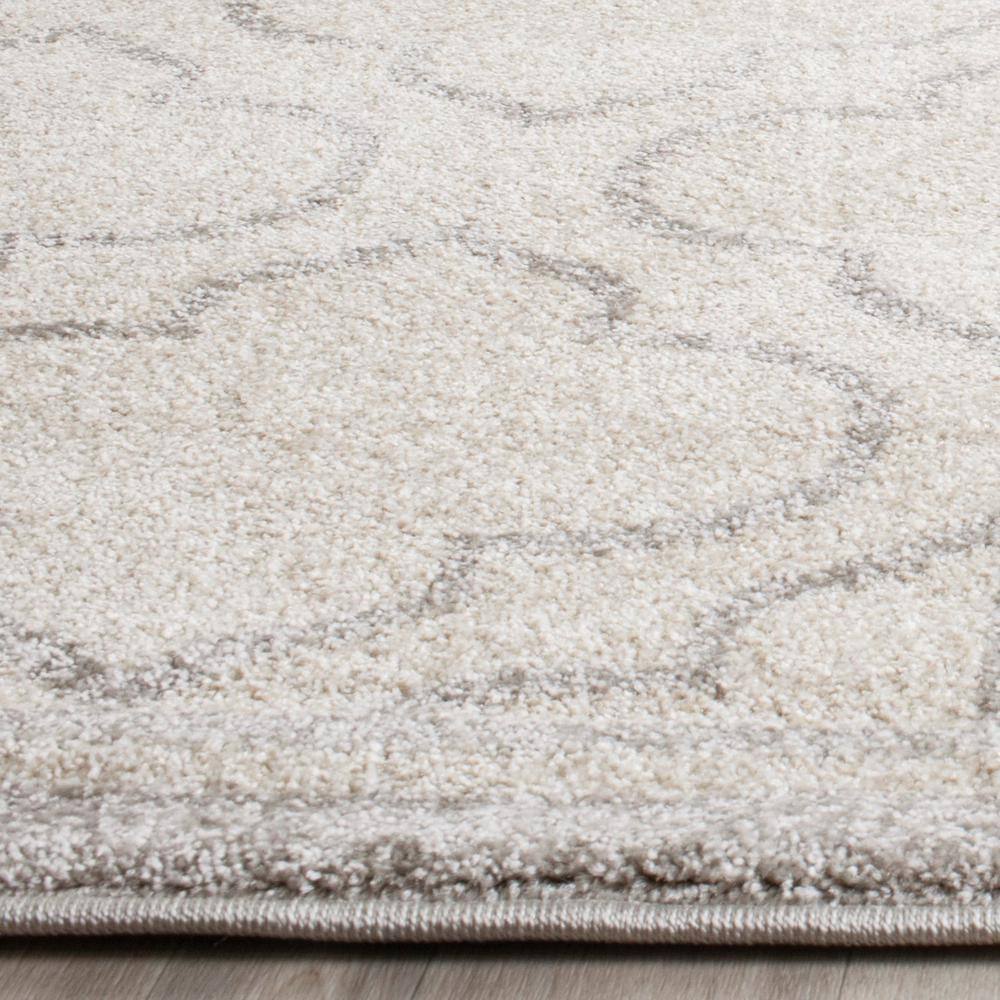 Ivory and Light Grey Rectangular Synthetic Area Rug 2'6" x 4'