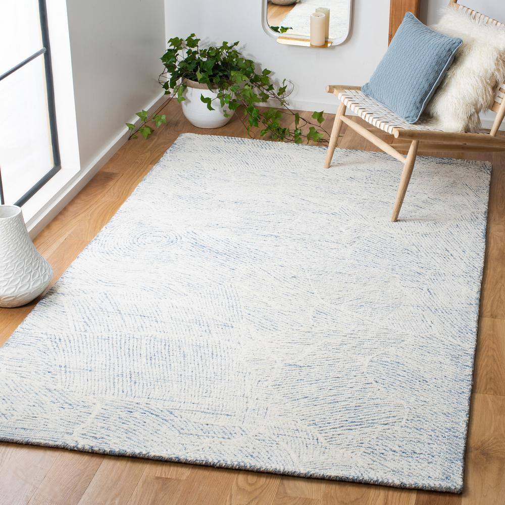 Blue and Ivory Floral Hand-Tufted Wool Area Rug, 5' x 8'