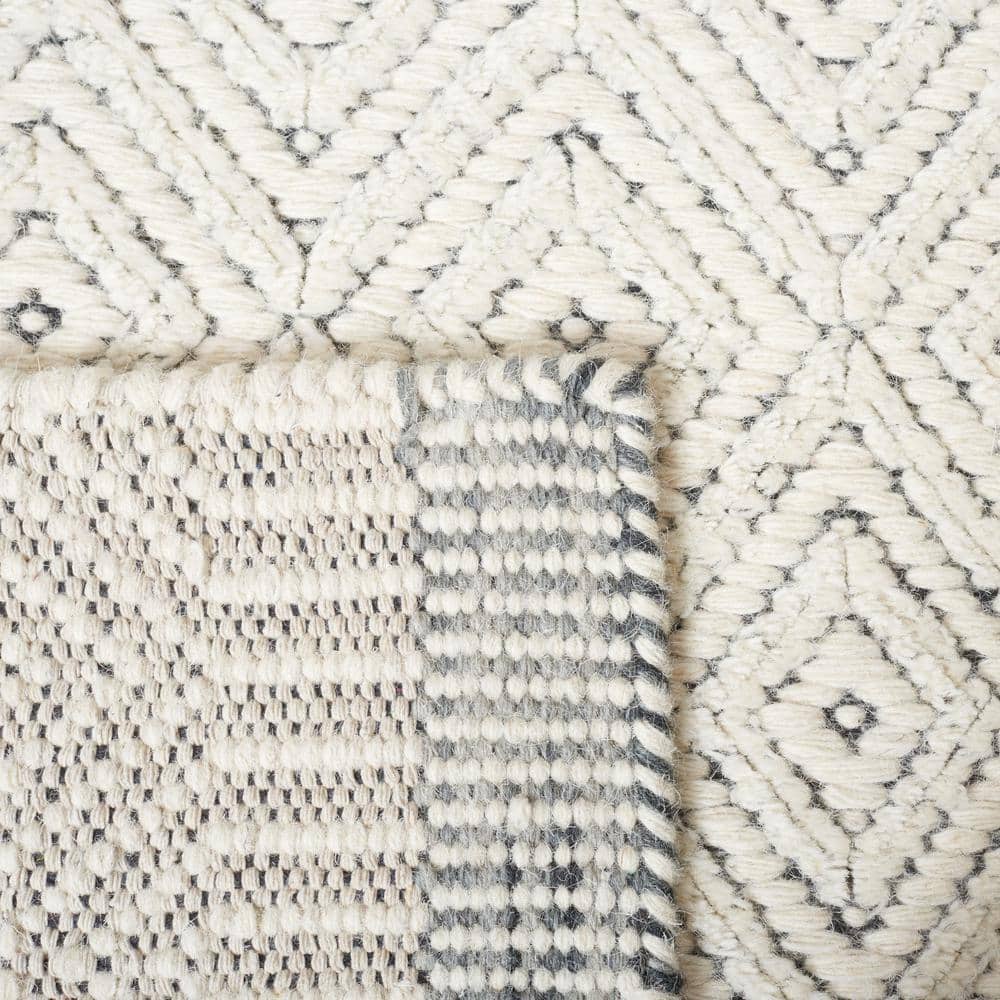 Ivory Tufted Rectangular Wool Area Rug, 5 ft. x 8 ft.